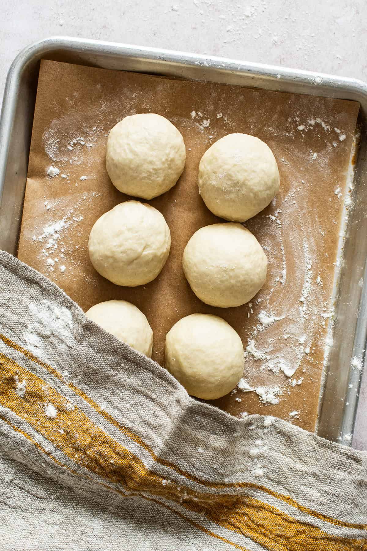 Flour tortilla dough formed into 8 equal balls