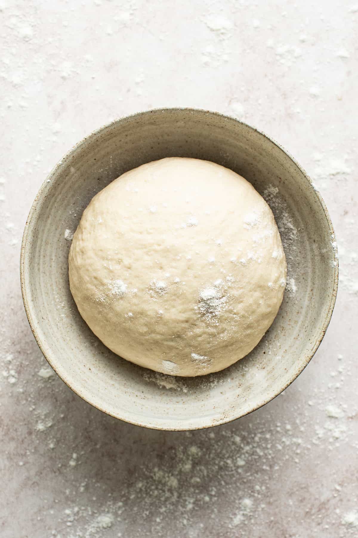 Sopapilla dough inside a large bowl ready to rest