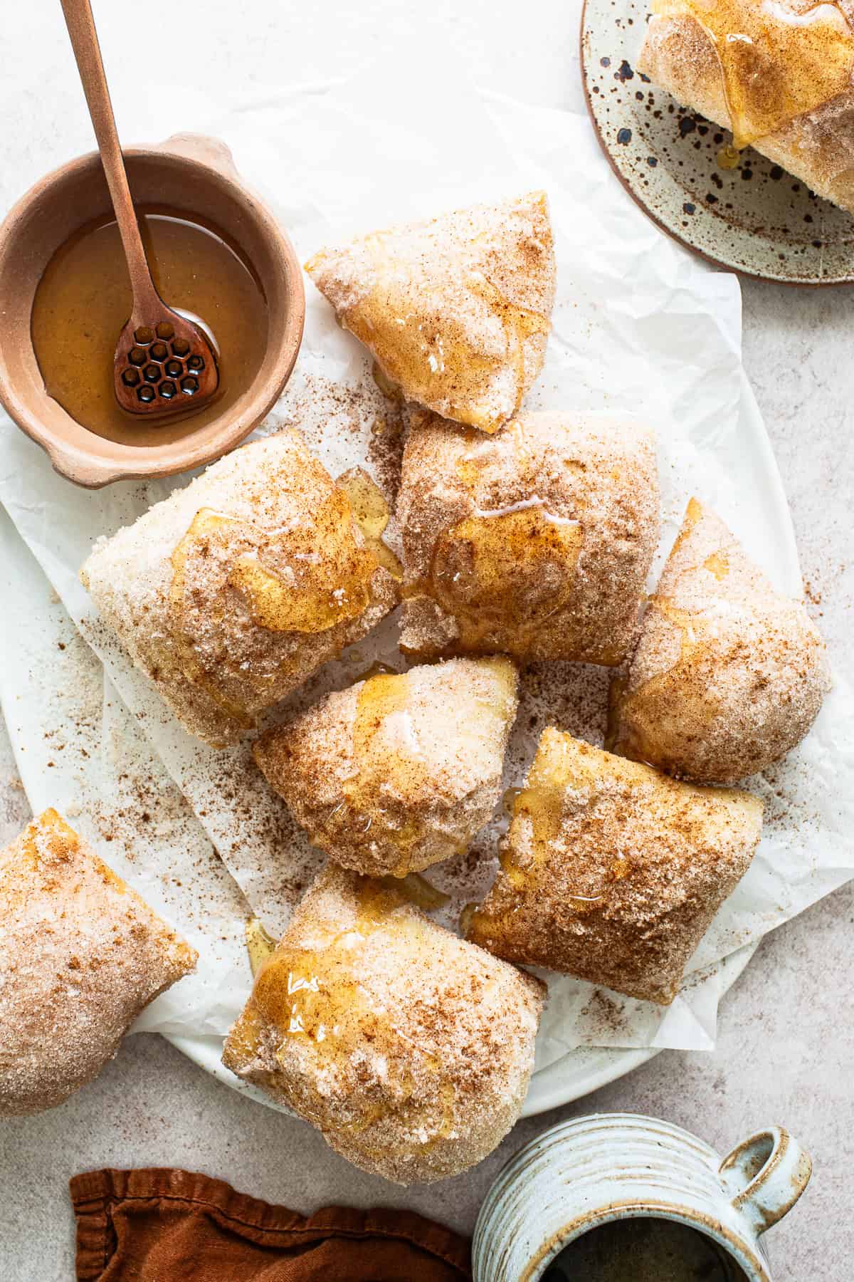 Sopapillas drizzled with honey and ready to eat 