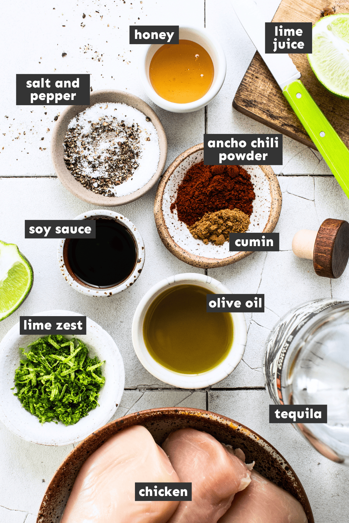 Tequila lime chicken ingredients measured out into mixing bowls 