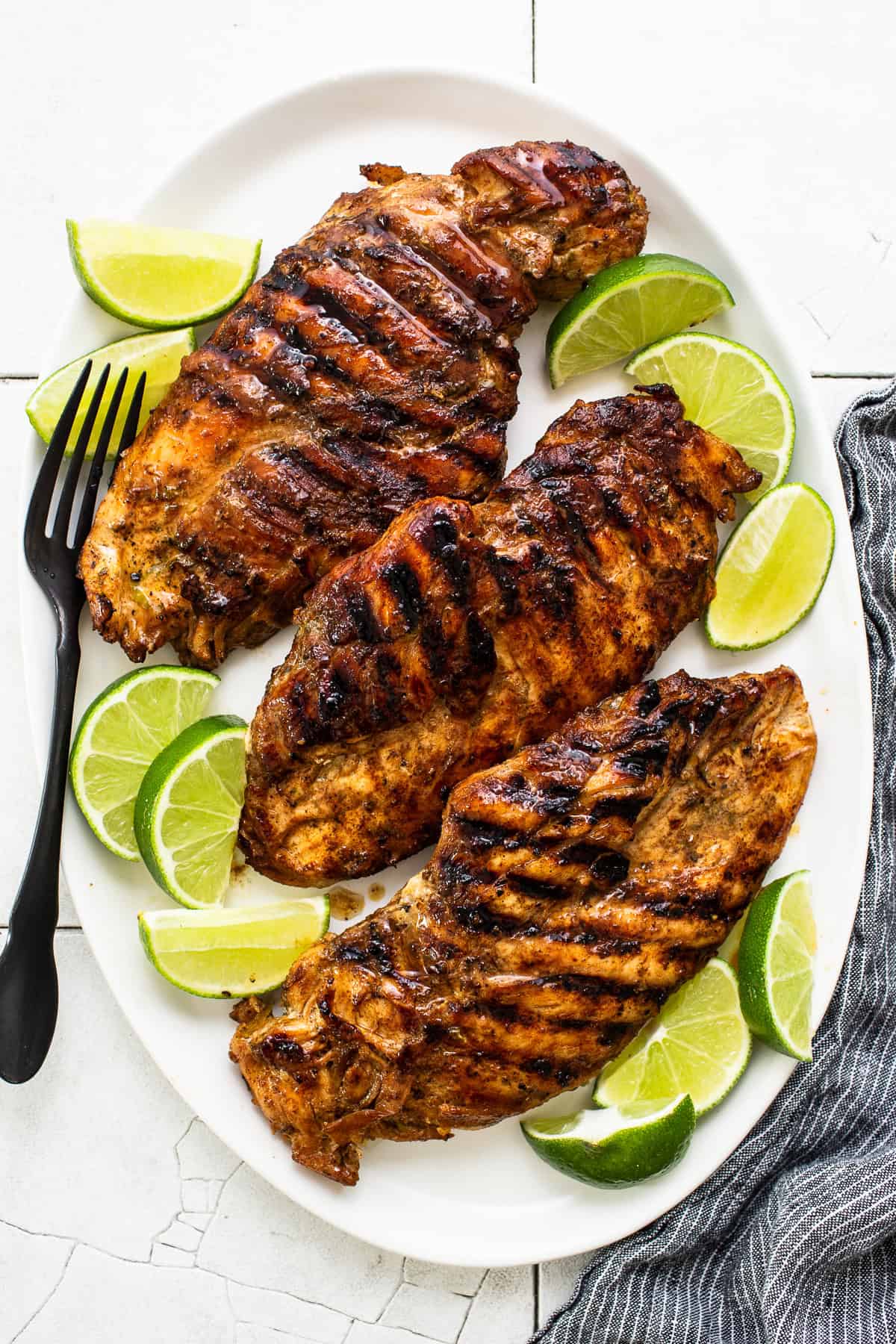 Grilled chicken placed on a plate