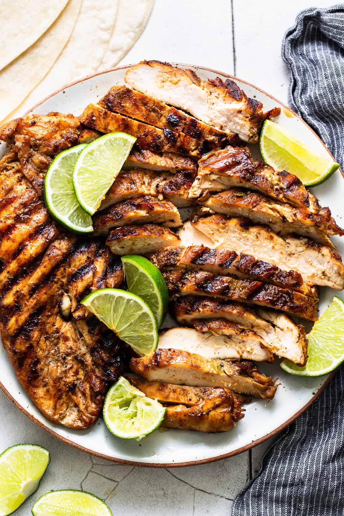 Tequila lime chicken sliced up and served on a plate