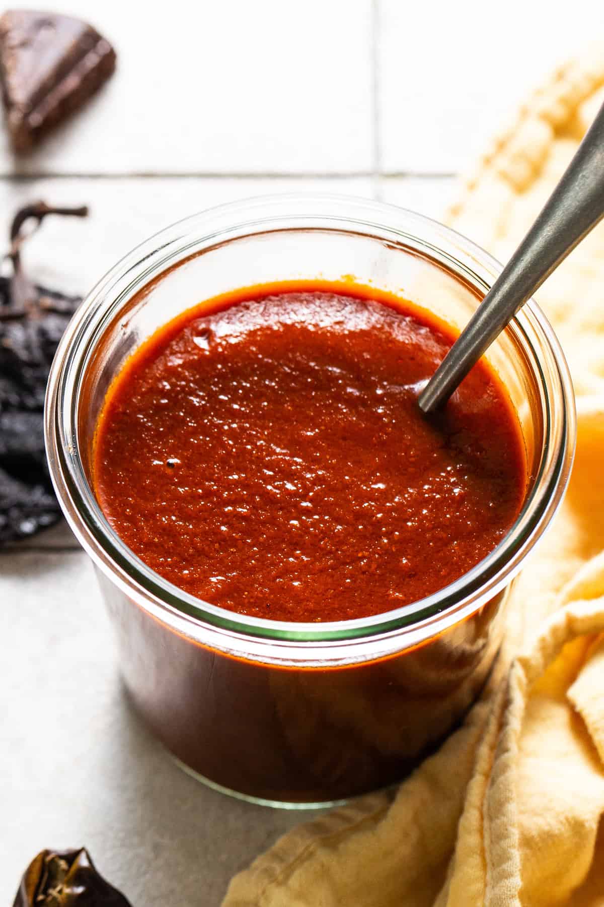 Authentic enchilada sauce ready to enjoy stored in a mason jar.