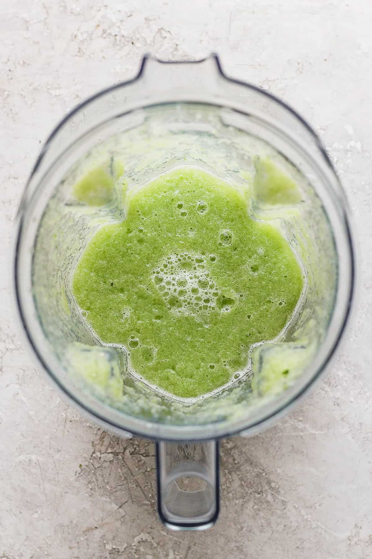 Blended cucumber juice in a blender.