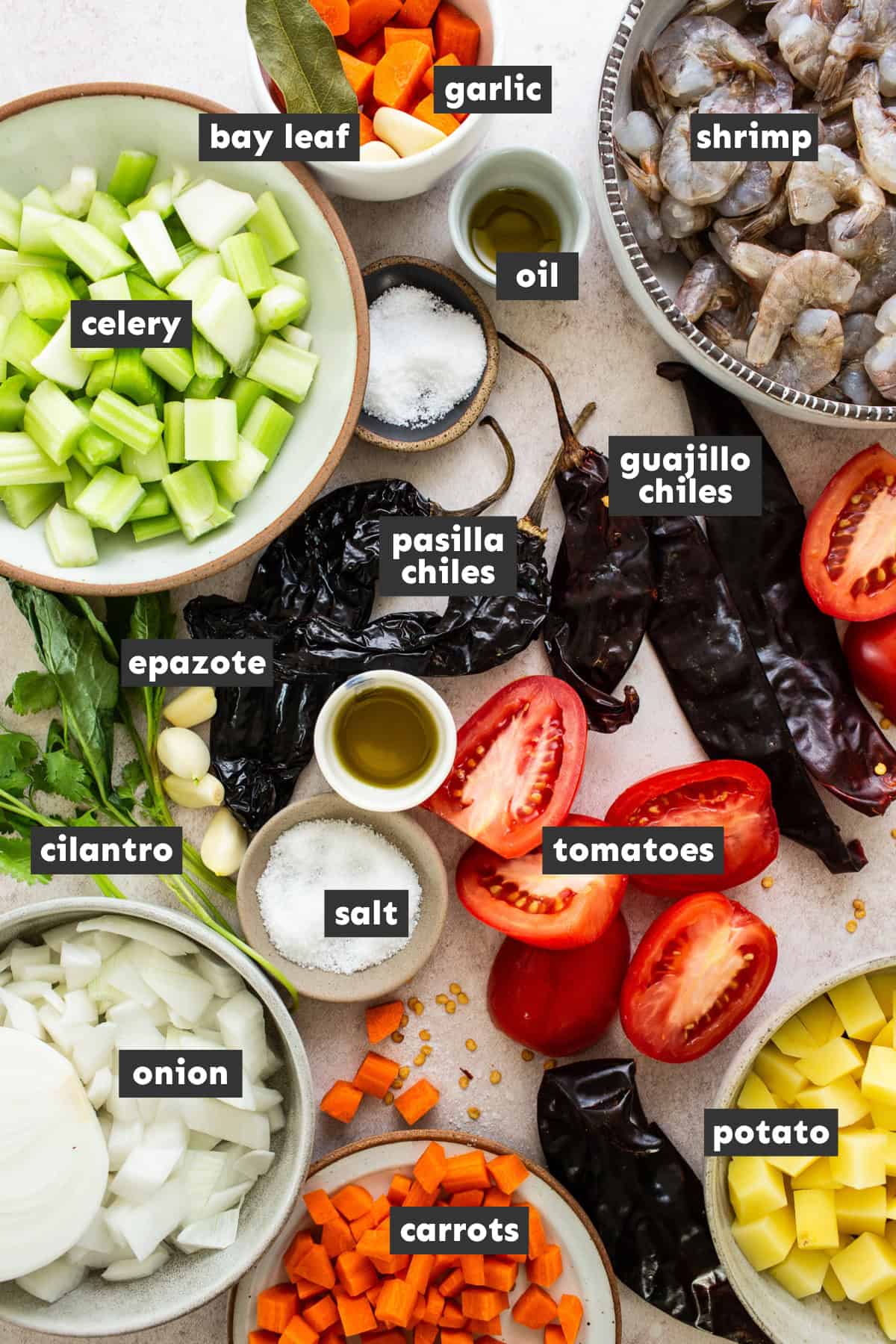 Caldo de camaron ingredients separated into mixing bowls