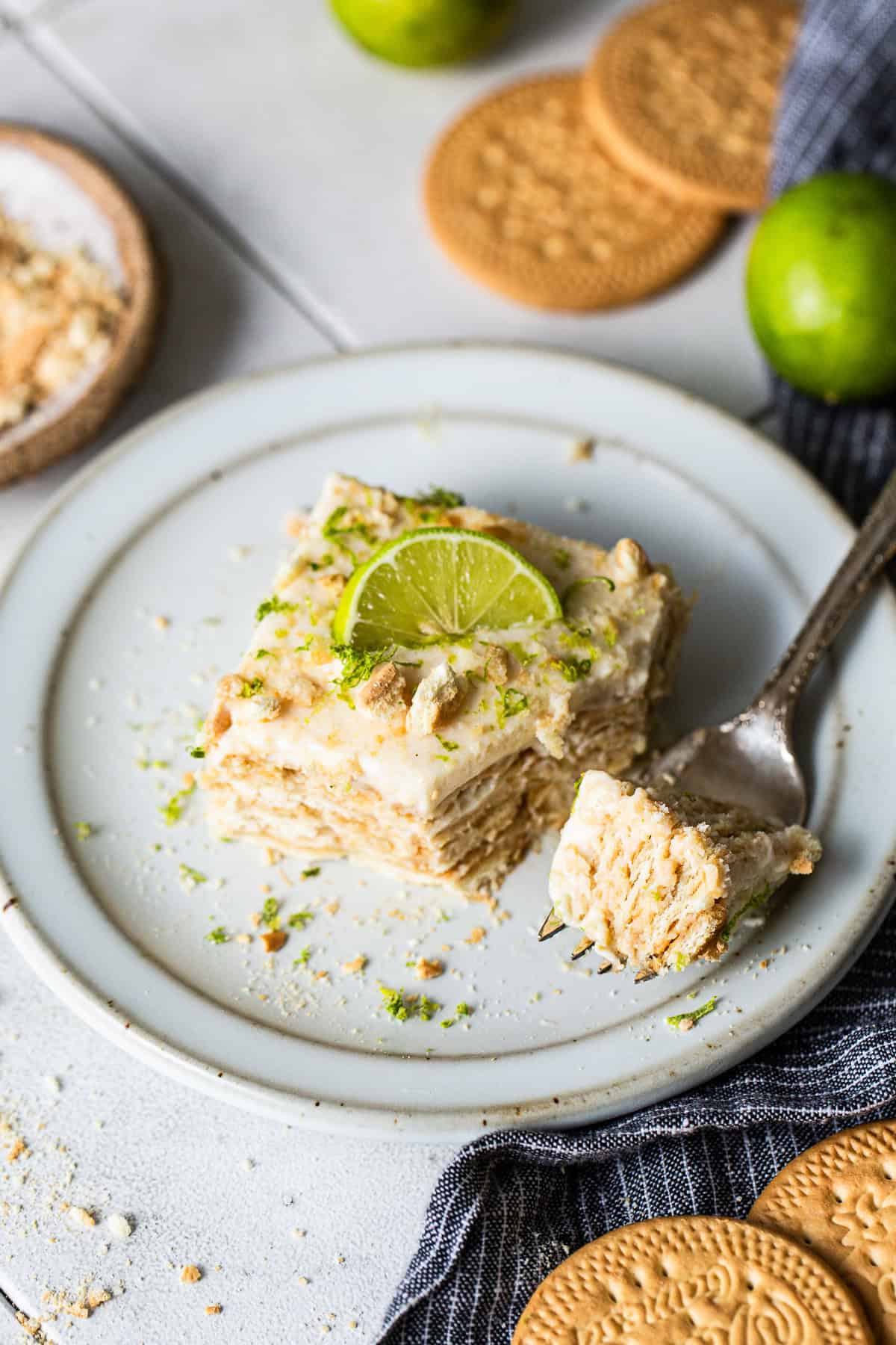 Carlota de limon served on a plate with toppings 