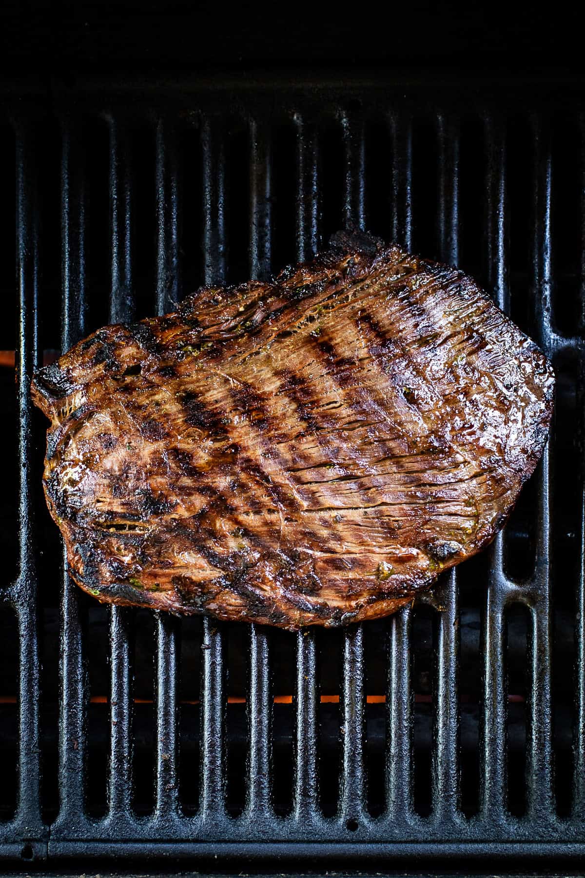 Carne asada being grilled.