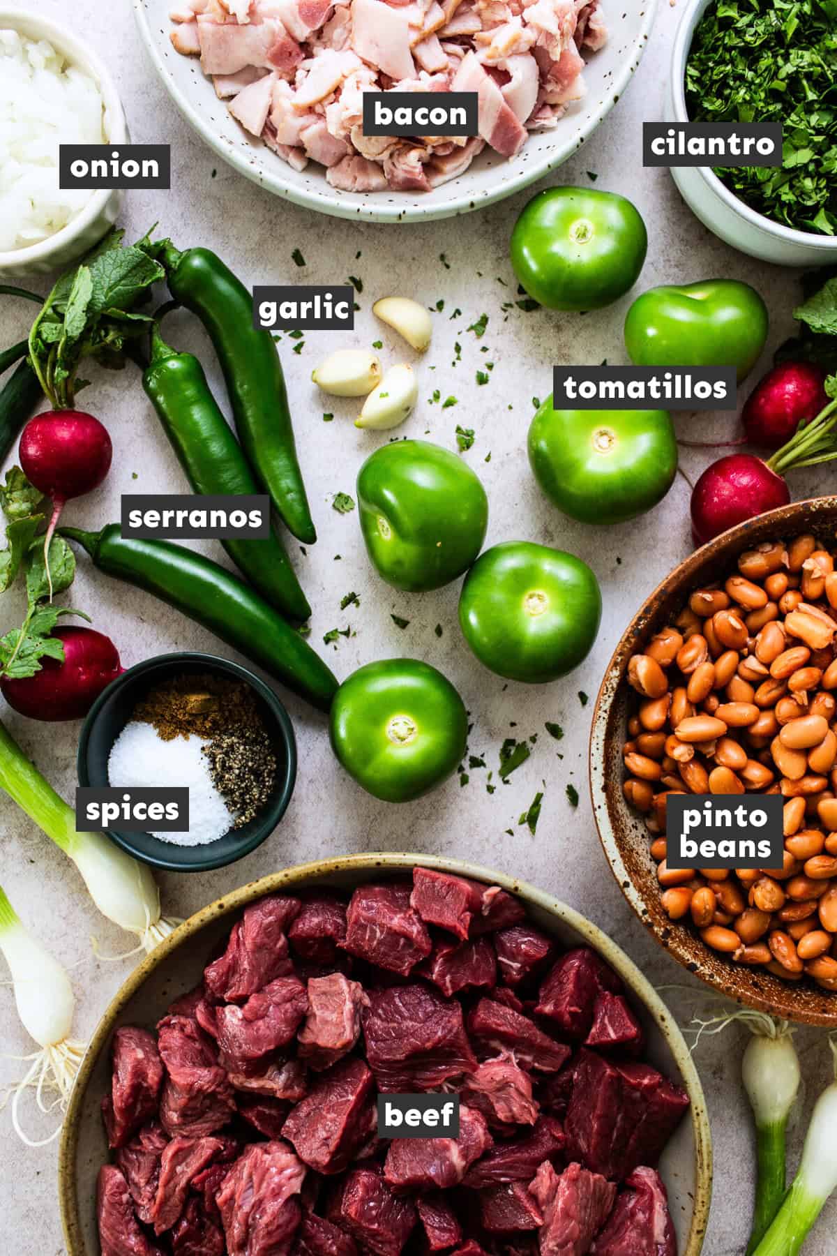 Carne en su jugo ingredients laid out ready to use.