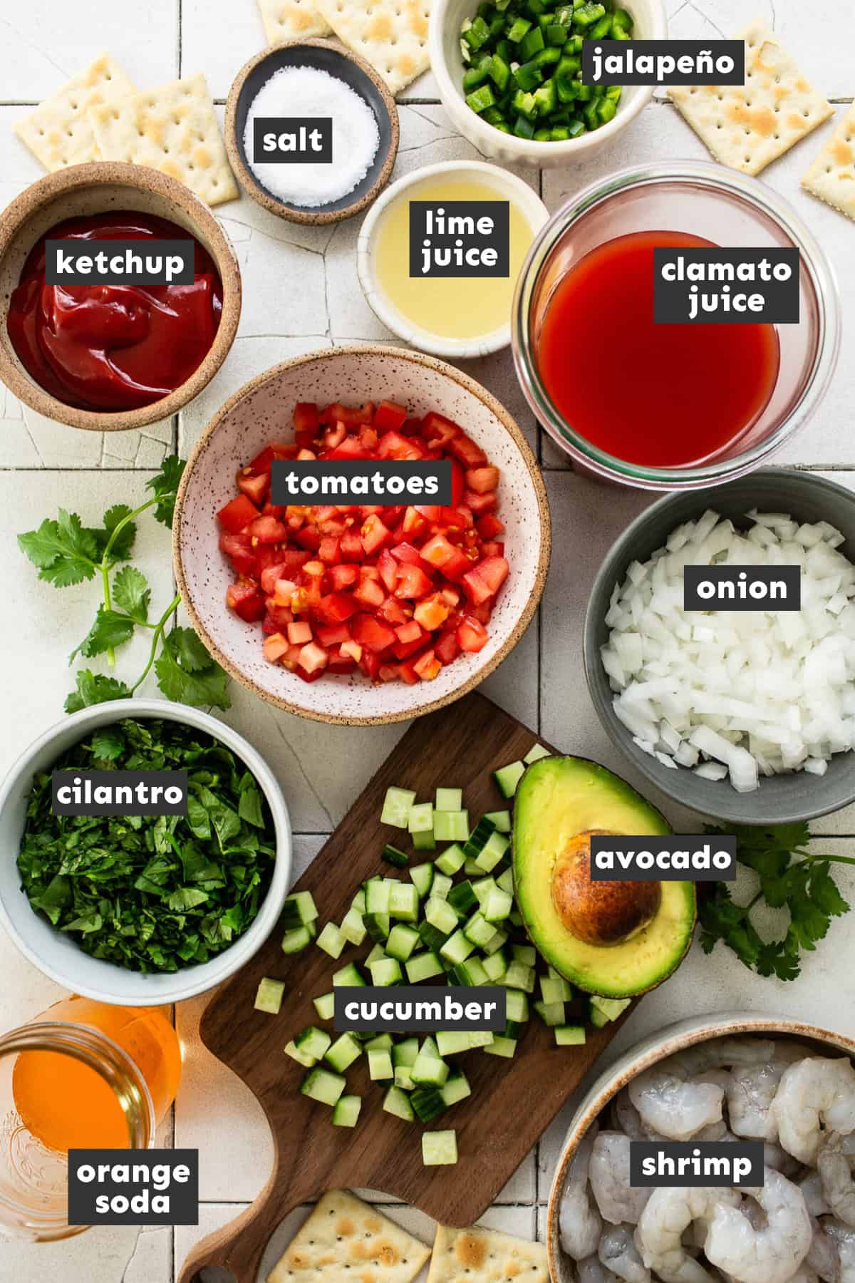 Coctel de camaron ingredients measured into separate mixing bowls ready to use