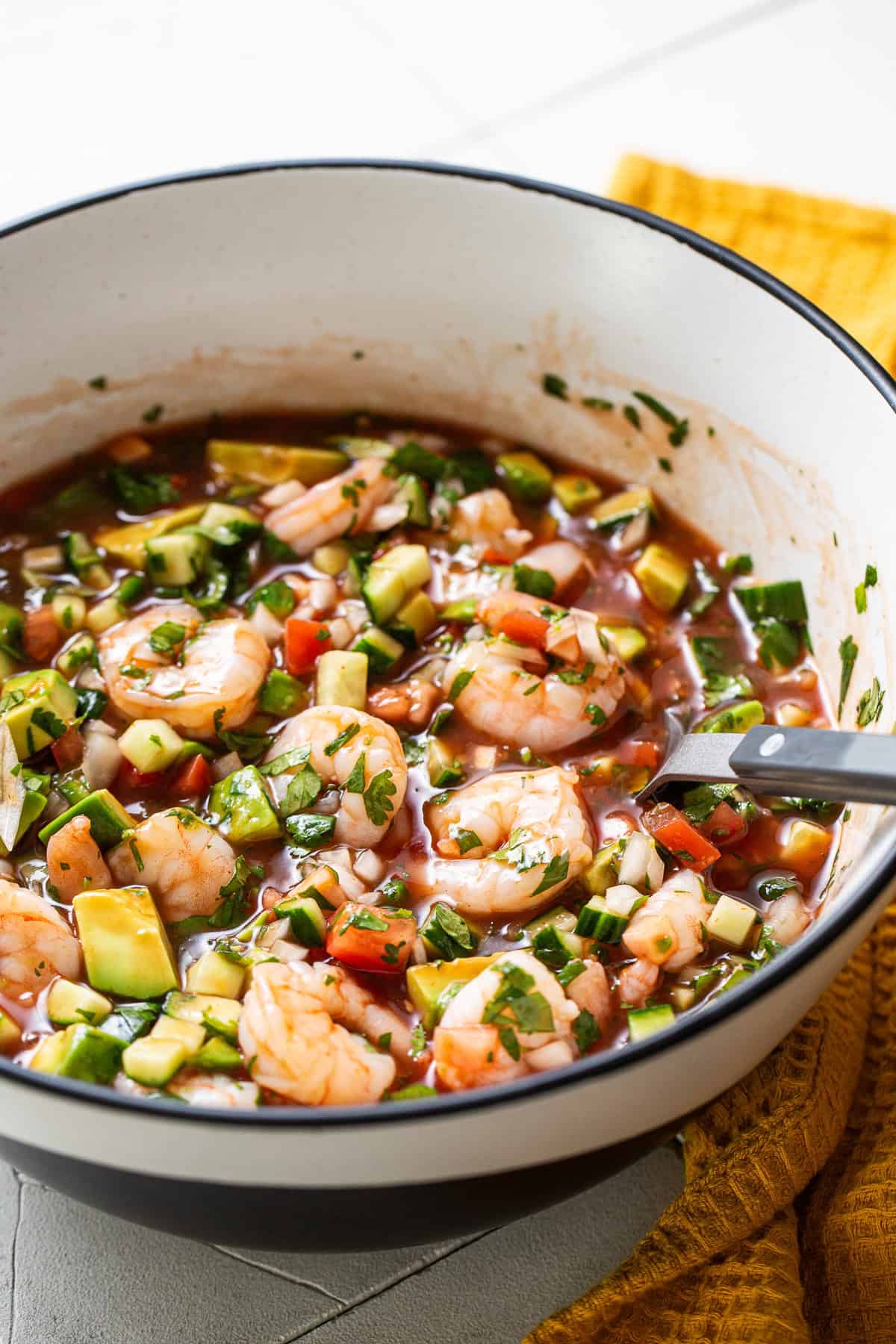 Mix all ingredients together in a  bowl and add in the poached shrimp