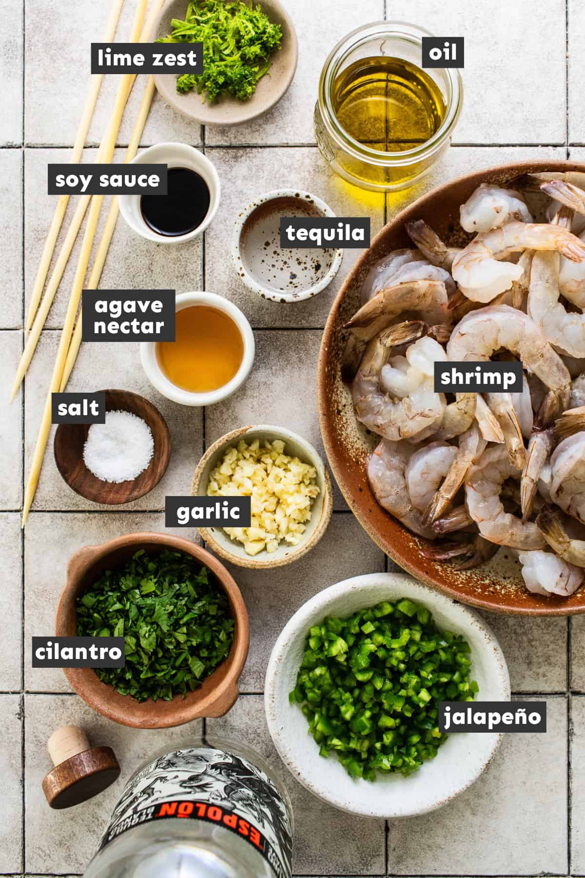 Grilled shrimp skewer ingredients separated into mixing bowls.