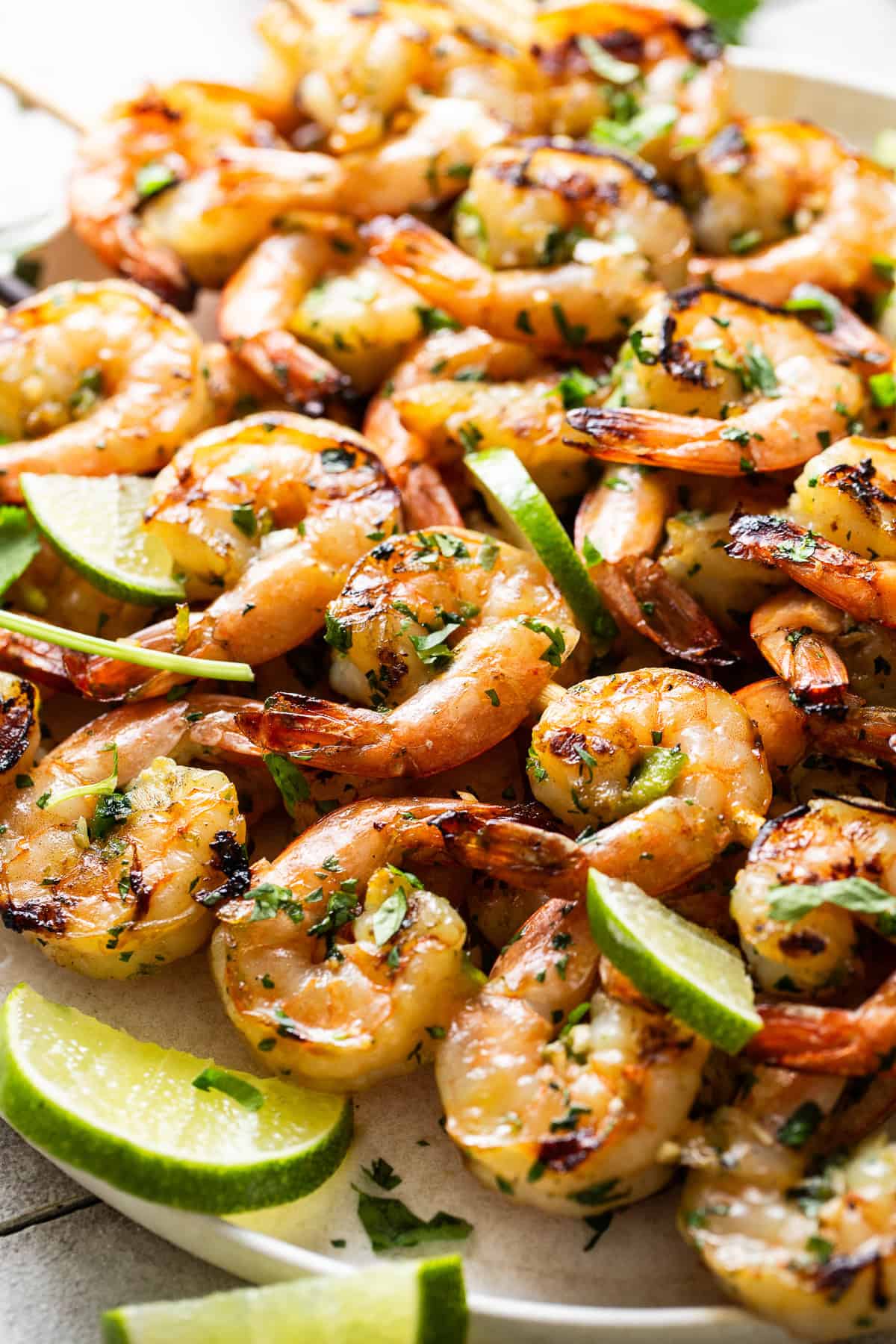 Grilled shrimp skewers coated with lime juice.