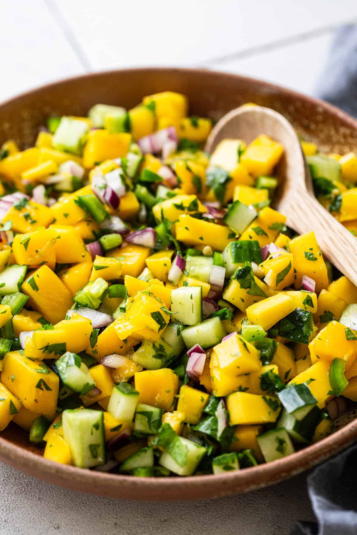 Mango salsa in a large serving bowl