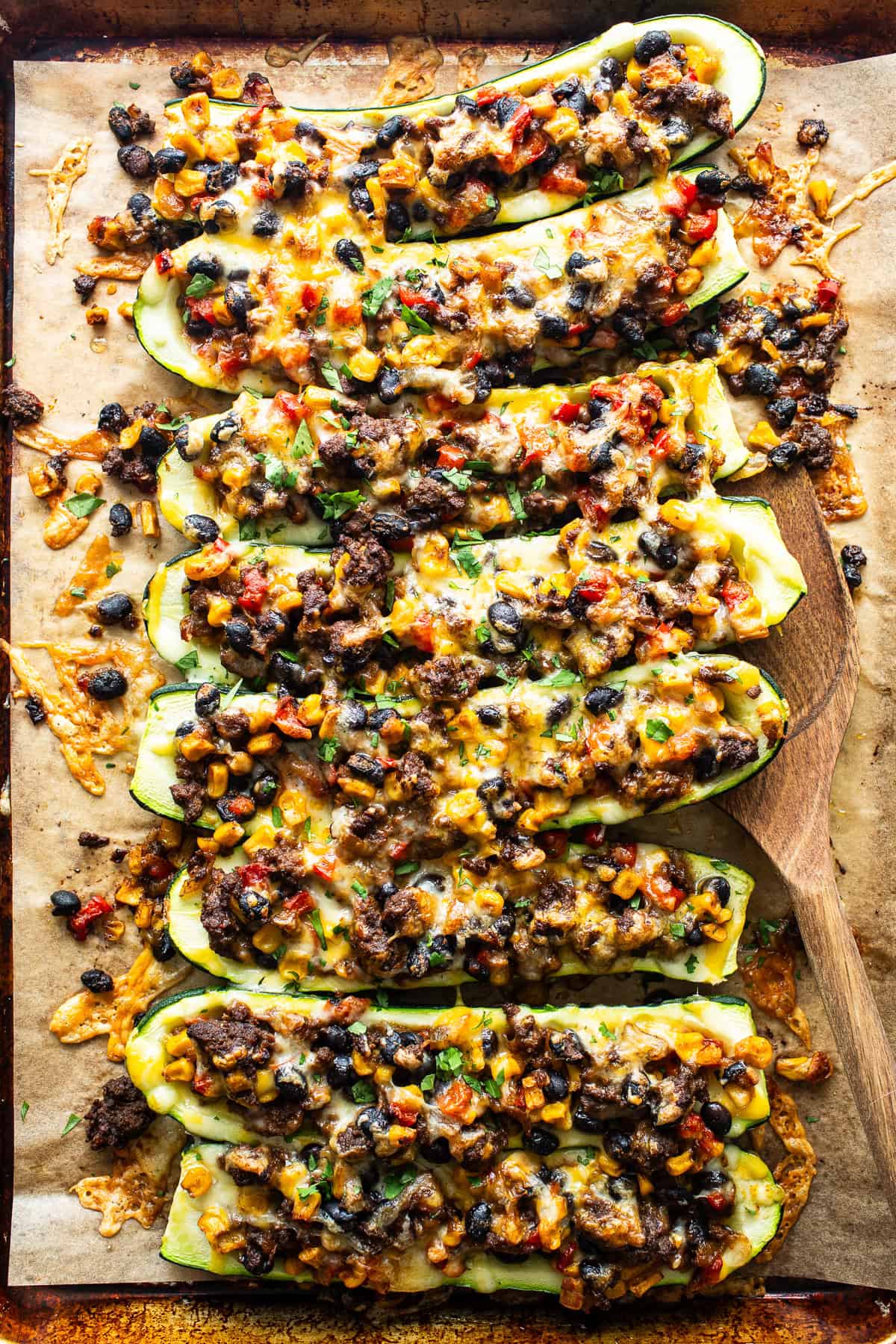 Mexican stuffed zucchini boats baked and ready to serve.