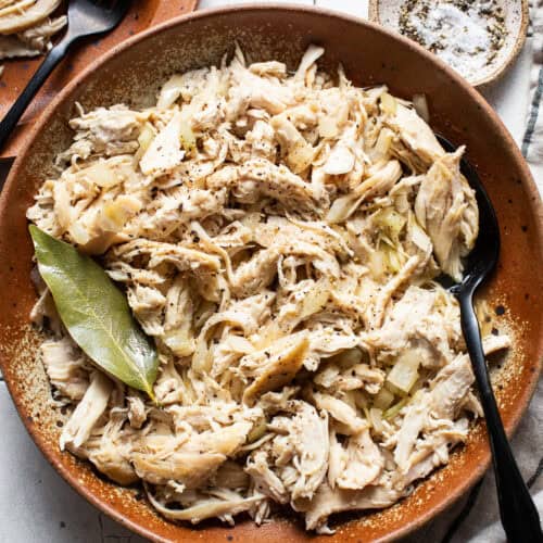 Shredded chicken in a bowl ready to be used in recipes.