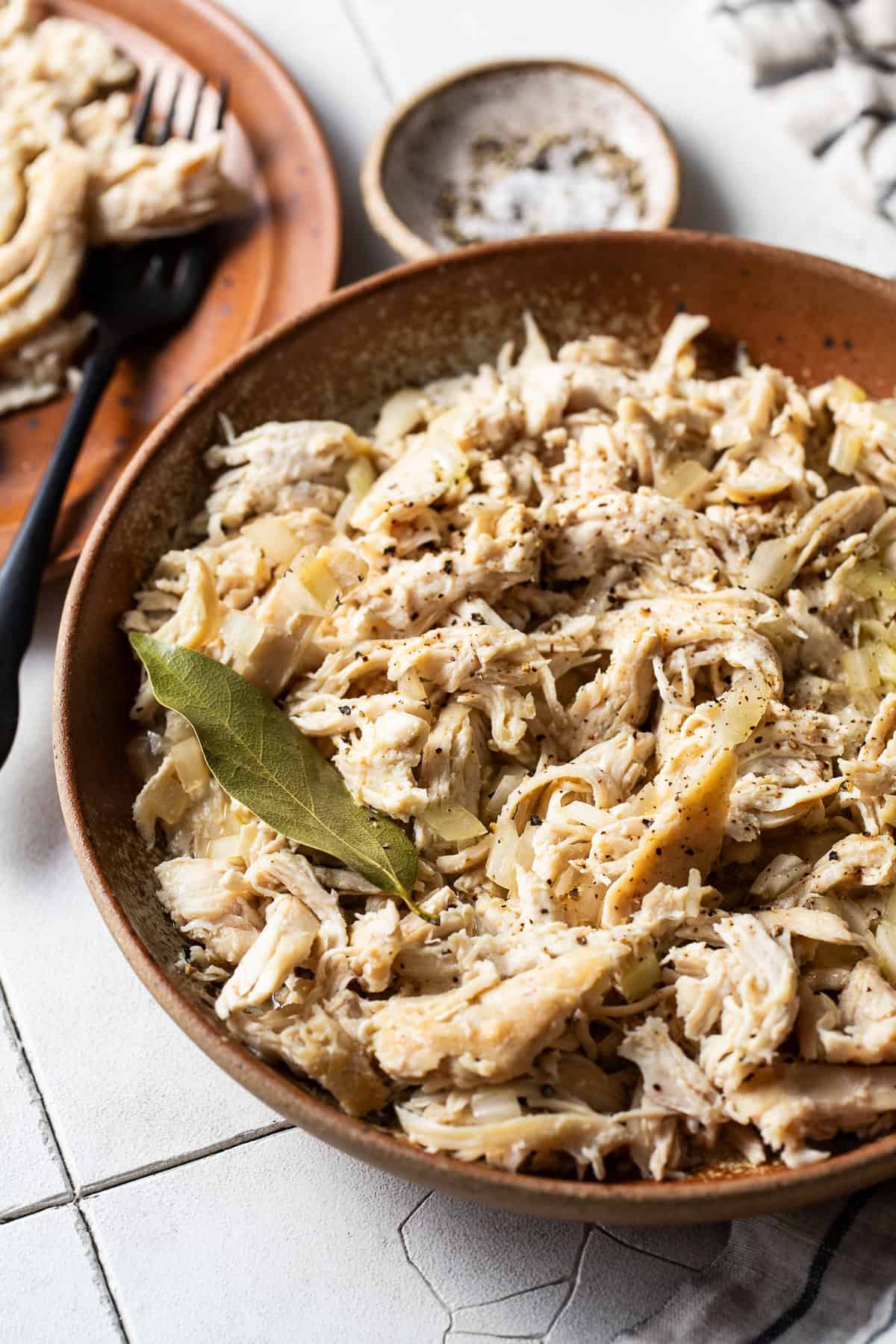 Juicy shredded chicken ready to be served in all sorts of dishes, from soups, stews, enchiladas, tacos, and casseroles.