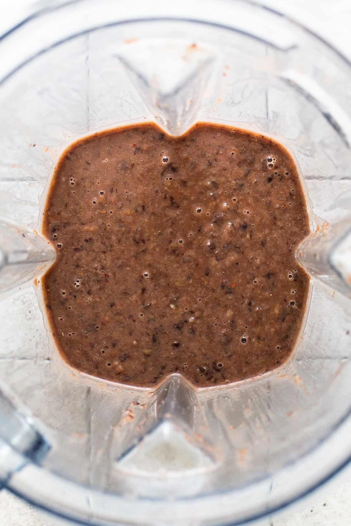 Black bean soup blended until smooth in a blender.