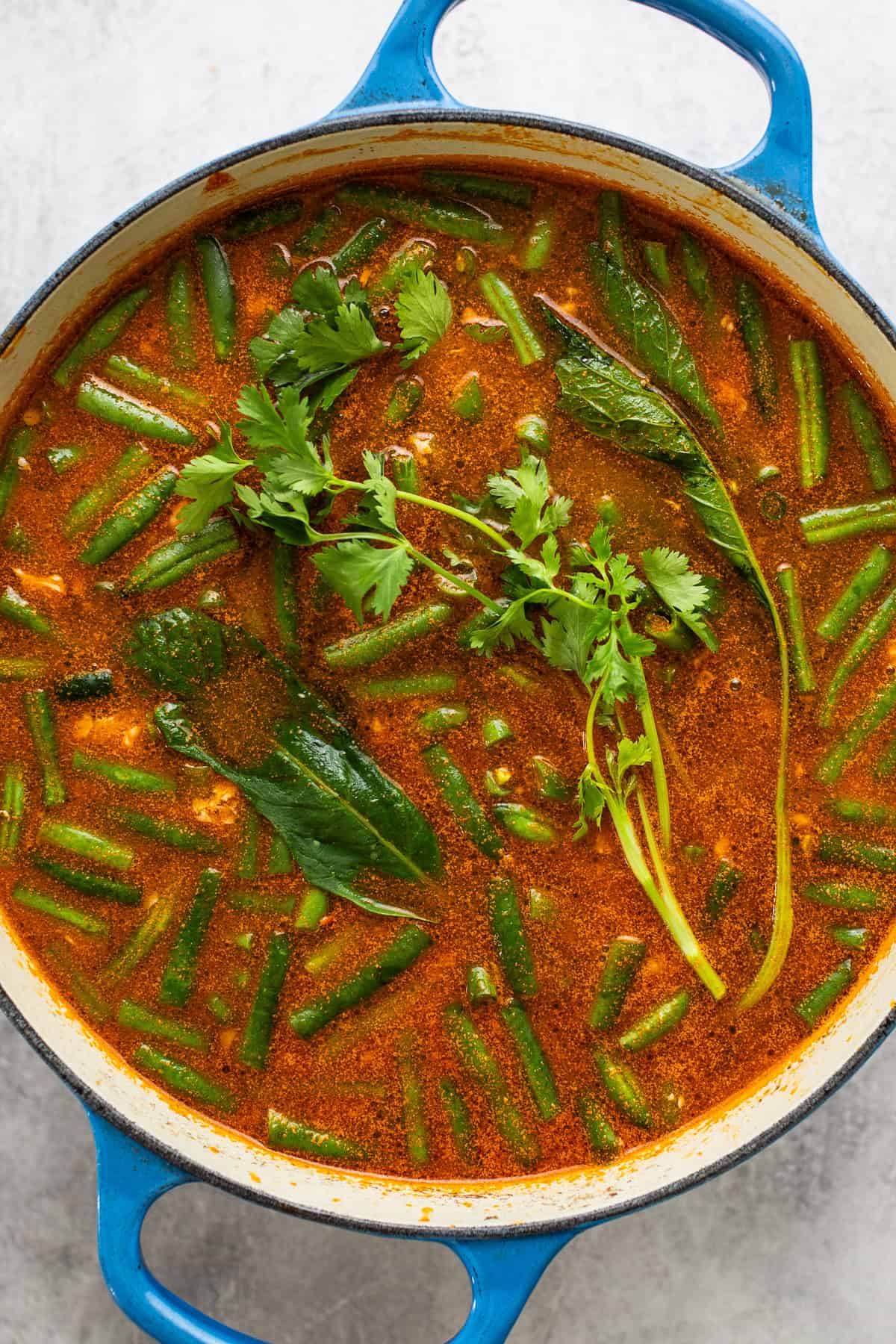 Caldo Tlalpeño simmering on the stove.