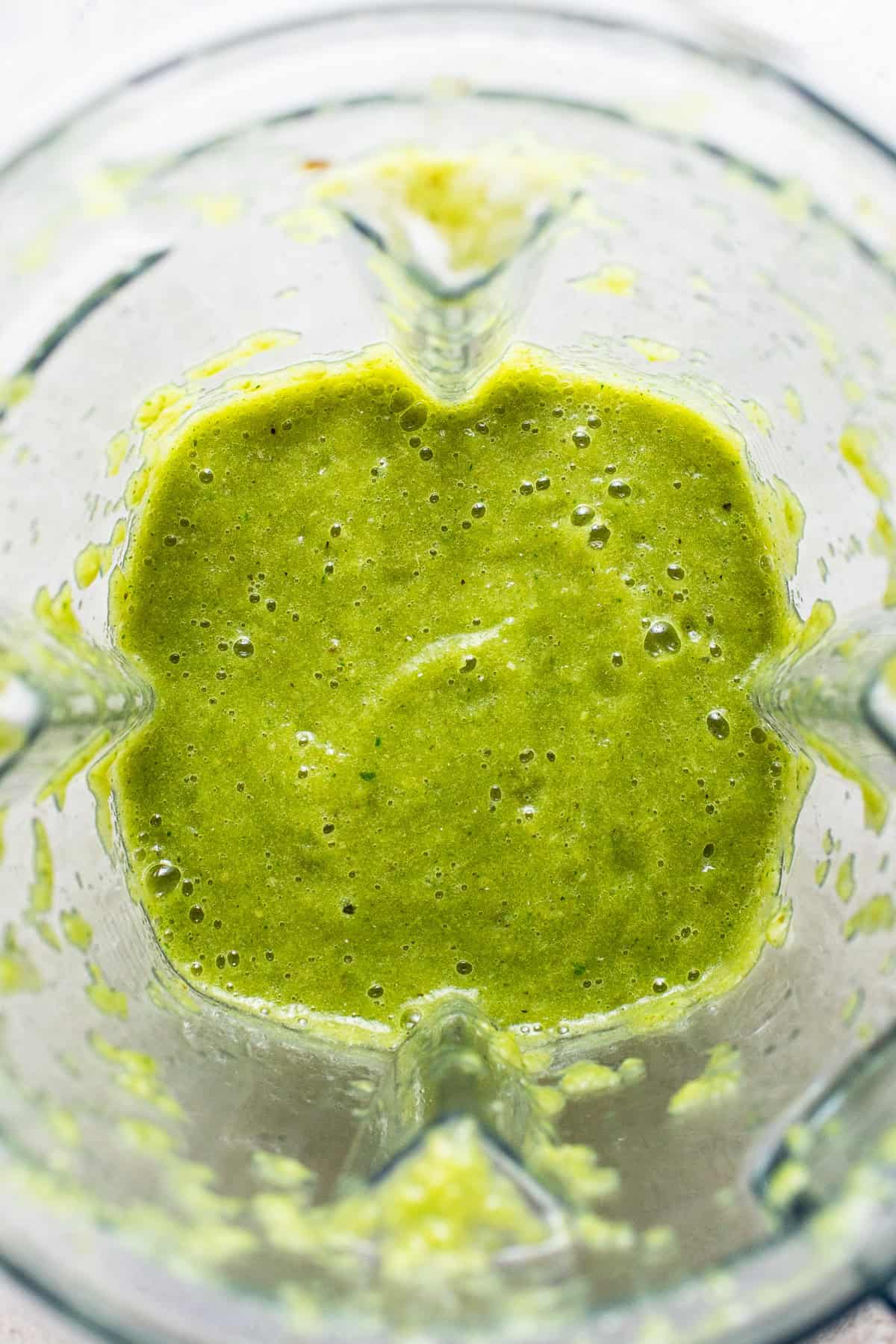 A blended salsa verde in a large blender.