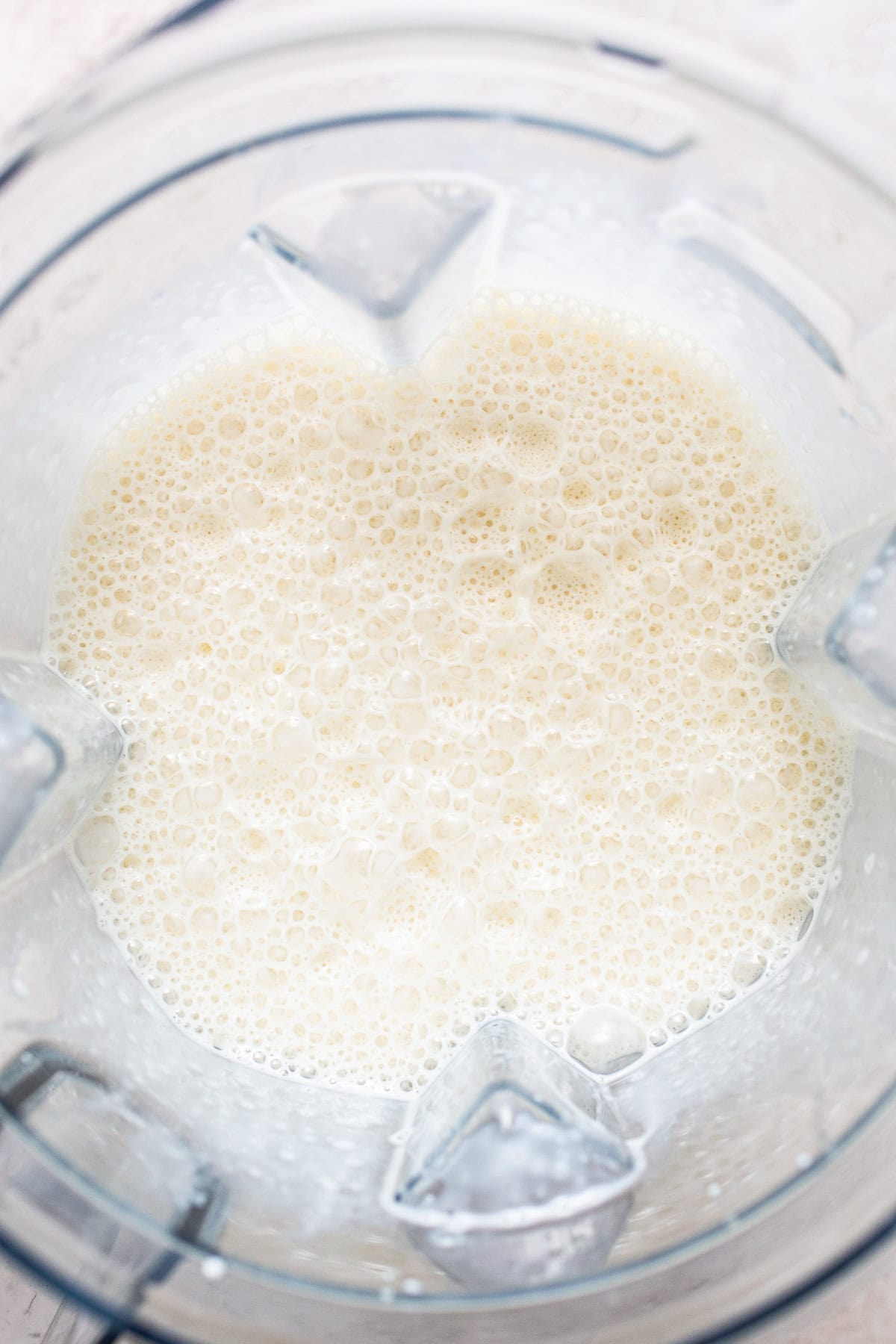 The milk gelatin for gelatina de mosaico in a blender before being poured into a bundt pan.