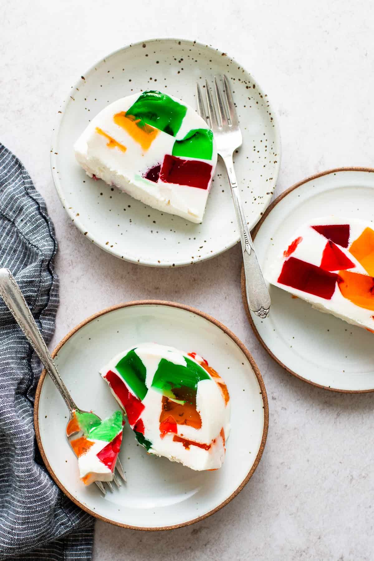 Colorful slices of gelatina de mosaico on a table ready to eat.