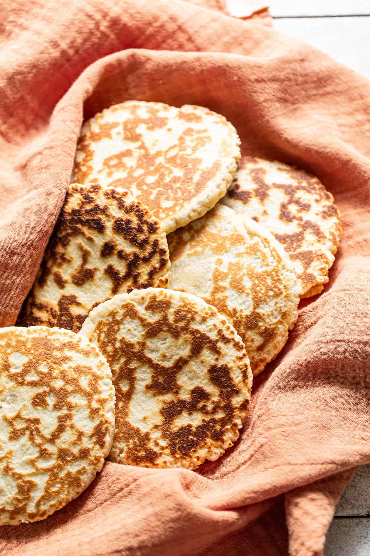 A basket with fresh gorditas de azucar ready to enjoy.