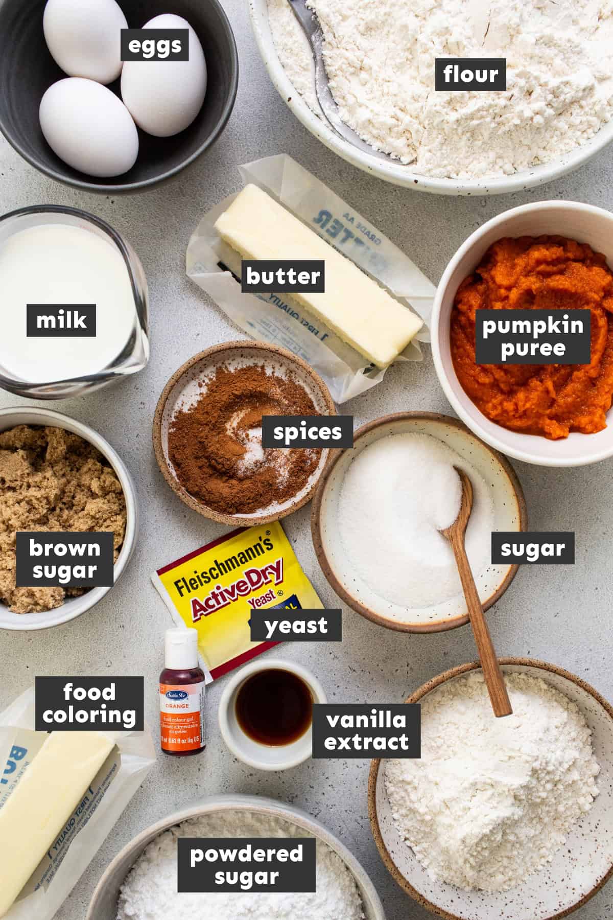 Ingredients for making pumpkin conchas on a table.