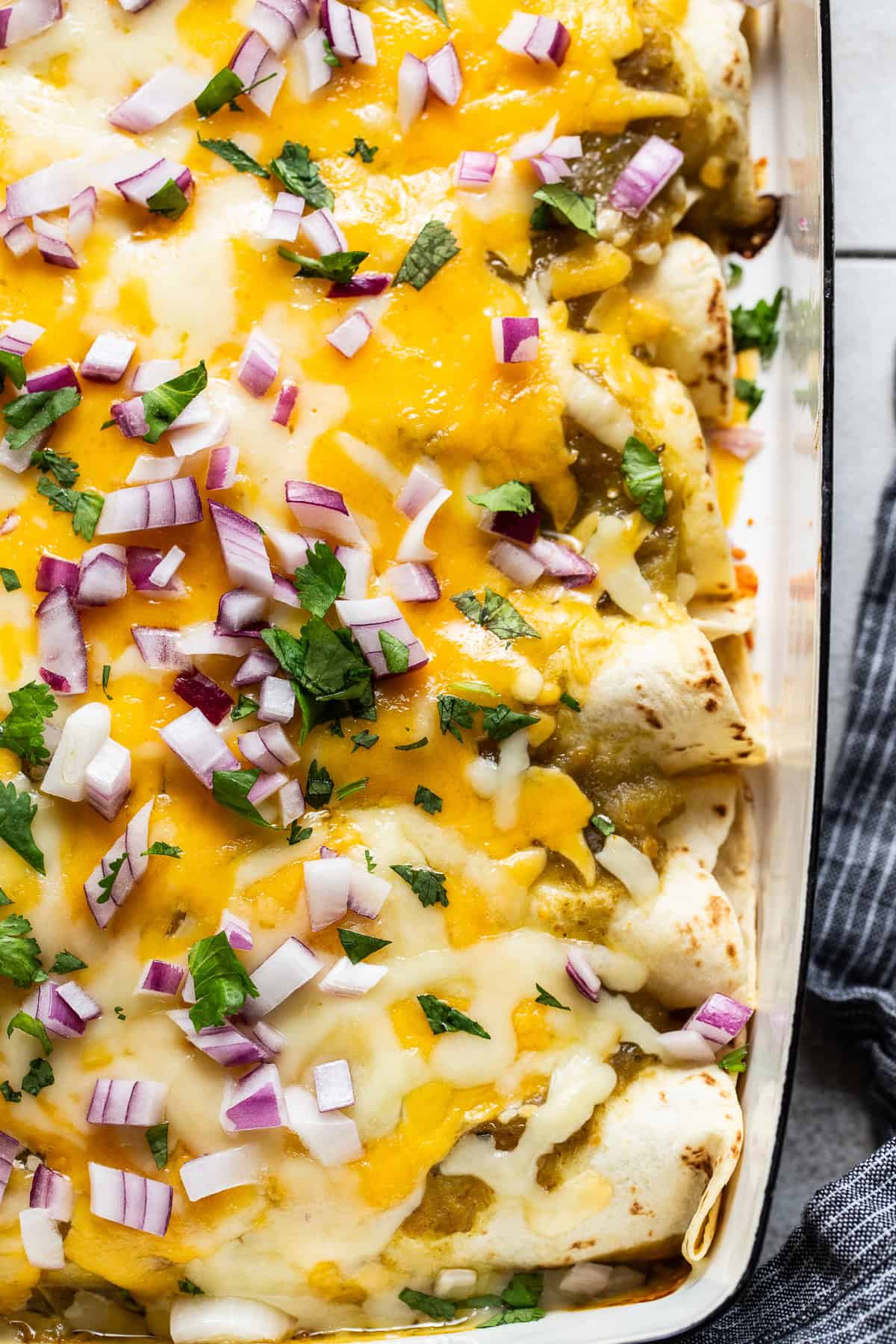 Baked spinach enchiladas ready to serve.