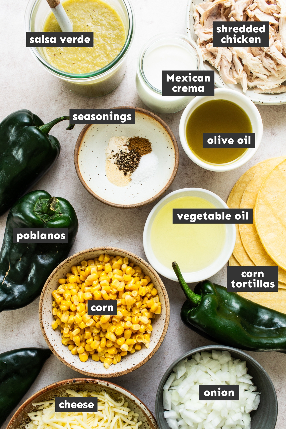 All ingredients for pastel Azteca laid out on a table ready to use.