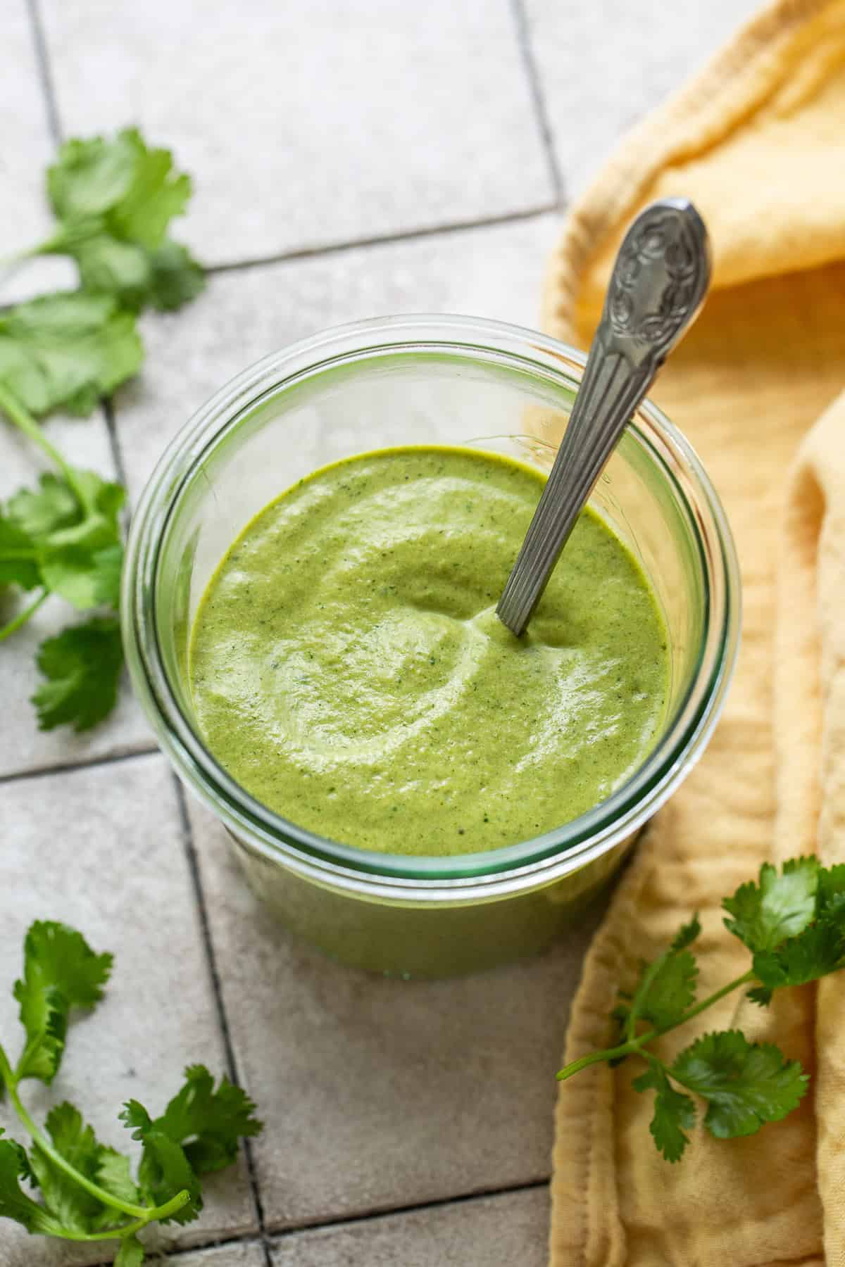 A mason jar used to store the freshly made poblano cream sauce. 