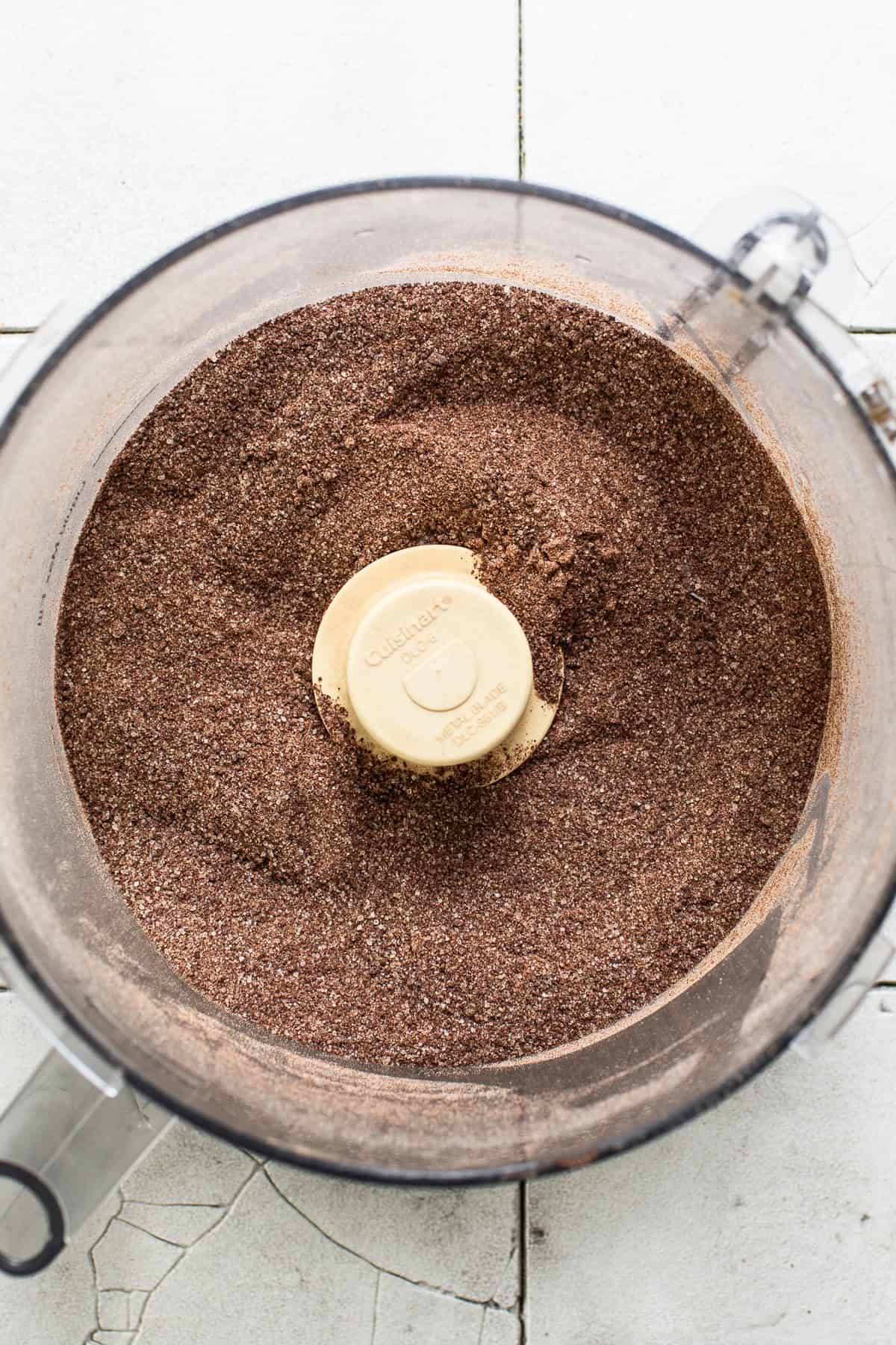 Ground Mexican chocolate in a food processor.