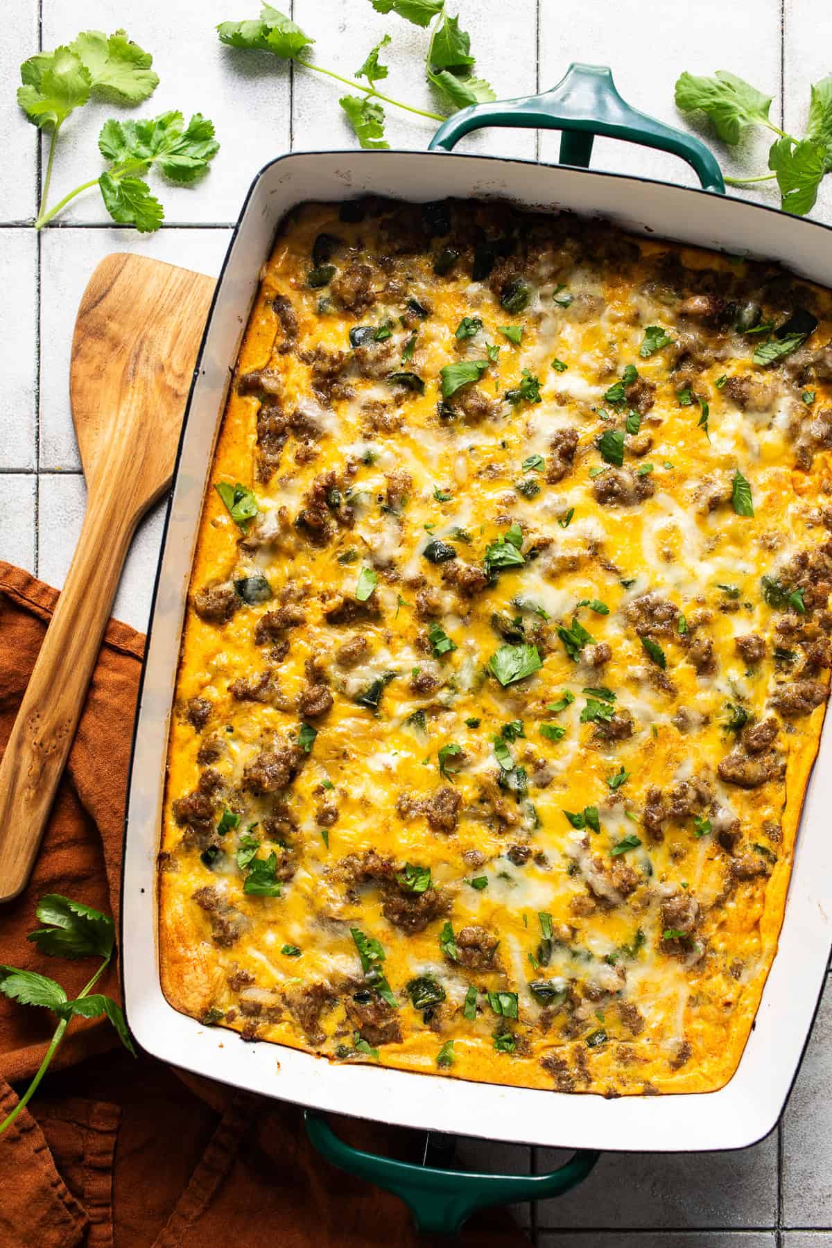 A crescent roll breakfast casserole in a baking dish ready to be served.