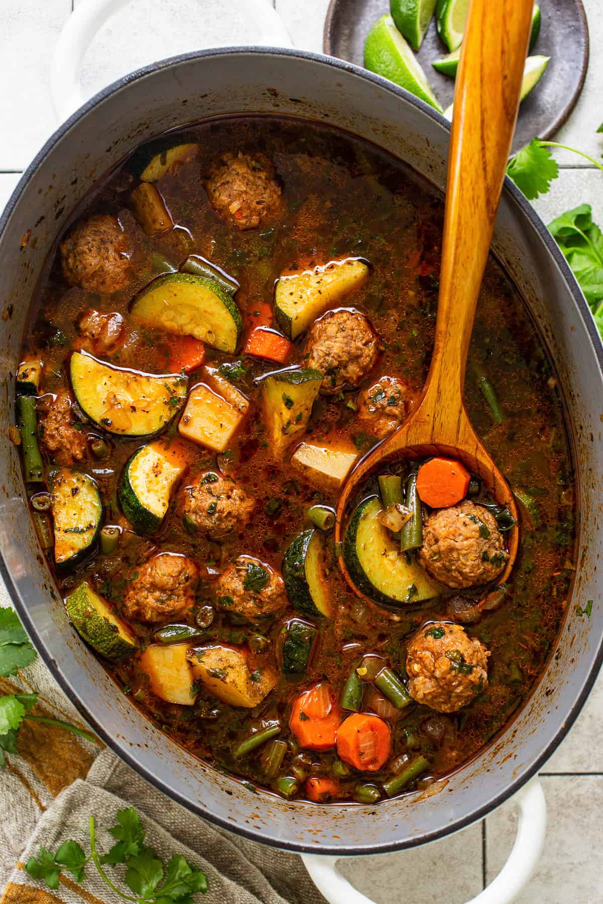 Albondigas soup ready to eat in a Dutch oven.