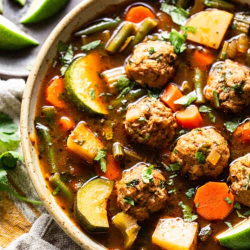 Albondigas soup recipe made with juicy mexican meatballs made from beef, chorizo, and rice.