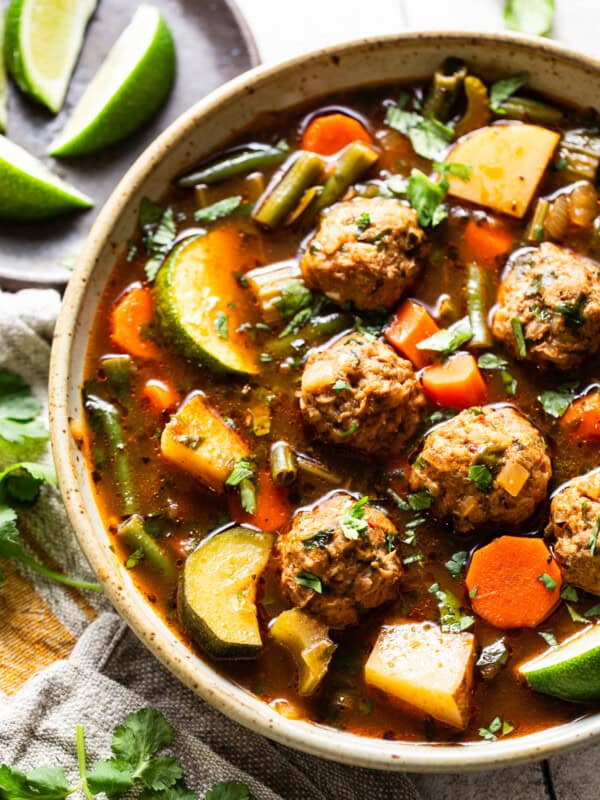 Albondigas soup recipe made with juicy mexican meatballs made from beef, chorizo, and rice.