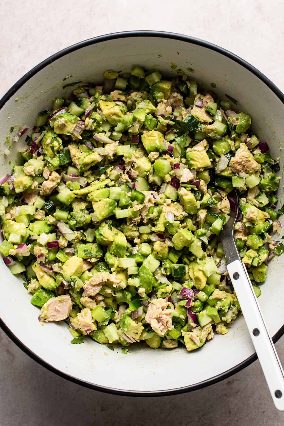 Once the tuna salad is completely mixed adjust the salt and pepper to taste.