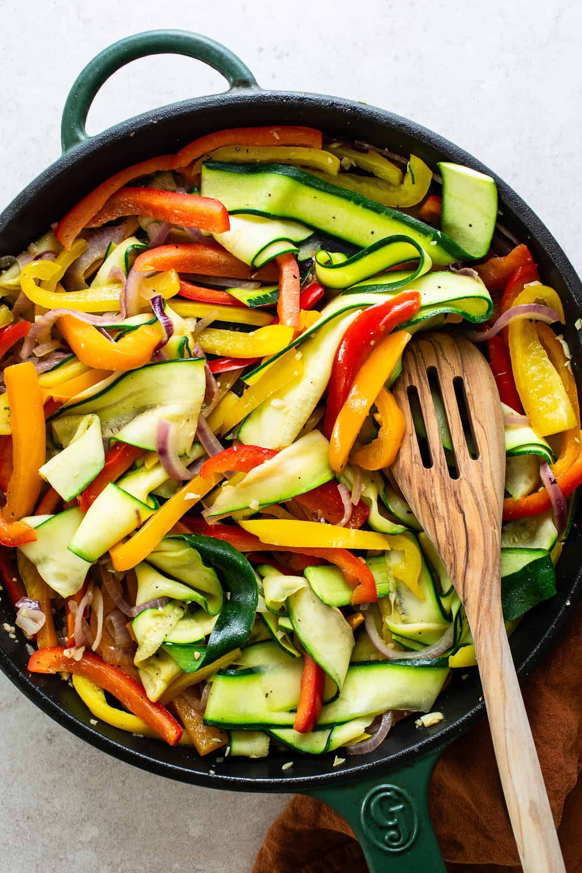 All vegetables cut and added to a skillet.