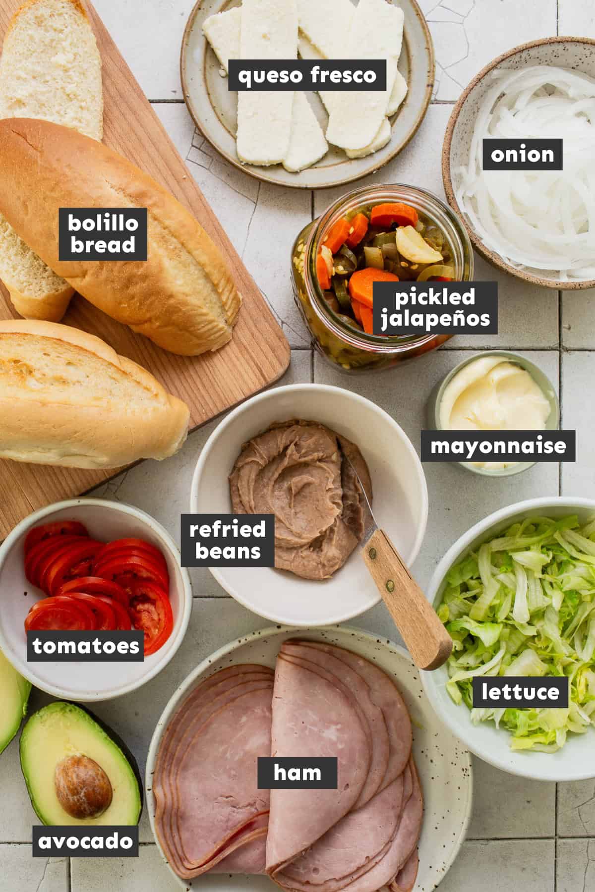 All of the ingredients for torta de jamon laid out on a table ready to use.